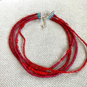 Beaded multi strand necklace